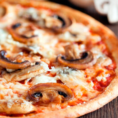 Muzza con champigñones